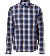 Stylish dress shirt in fine, pure cotton - Soft yet durable, lighter weight material - Classic plaid motif in rich shades of blue - Small collar, long cuffed sleeves and full button placket - Slim, slightly tapered silhouette - Casually elegant and ultra-versatile - Pair with chinos, shorts or jeans