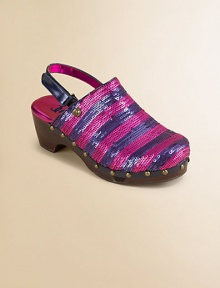 Striking, studded staple with wooden platform and heel gets a little jazzy in a striped sequin design and adjustable grip-tape slingback.Adjustable slingback with grip-tape closureRubber upperWood solePadded insoleMade in the USA Striking, studded staple with wooden platform and heel gets a little jazzy in a striped sequin design and adjustable grip-tape slingback.Adjustable slingback with grip-tape closureRubber upperWood solePadded insoleMade in the USA