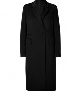 Luxurious coat in fine black wool - A modern classic, buy once, wear forever - Feminine, slim cut, about knee length - Short lapels, flap pockets, breast pocket and hook closure - Ingenious all-around coat, a dream piece that looks elegant and classic on the one hand, modern and feminine on the other - Wear with a business suit to work and for evening wih a cocktail dress