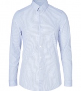 A timeless-modern style, Jil Sanders striped button-down is a characteristic chic take on the classic shirt - Classic collar, long sleeves, buttoned cuffs, button-down front, shirttail hemline - Slim fit - Wear tucked into tailored trousers with sleek leather lace-ups
