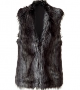 A stylish alternative to the classic jacket, this faux fur vest brings trend-right chic to your cold weather ensembles - Small shawl collar, sleeveless, front closure, faux fur - Pair with a cashmere pullover, skinny jeans, and over-the-knee boots