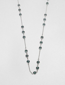 From the Black Tie Optional Collection. A long-enough-to-double chain is dotted with trios of faceted green stones in this graceful variation on a classic design.Glass and plasticSilvertoneLength, about 48Lobster claspImported