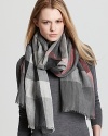 An oversized check pattern in gray and pink gives this lightweight Burberry scarf a cool, seasonal update.