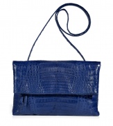 Invest in multi-season sophistication with Nancy Gonzalezs sleek fold-over croco clutch, an ultra luxurious choice in cool royal blue - Fold-over with hidden magnetic snaps and zippered pocket underneath, back slit pocket with magnetic closure, inside zippered back wall pocket, tonal suede lining, removable shoulder strap - Carry as a finish to chic day and evening looks alike