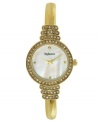 Put your best foot forward with this gleaming watch by Style&co. Gold tone mixed metal bangle bracelet and round case with crystal-accented link. Bezel embellished with crystal accents. Mother-of-pearl dial features four gold tone dot markers, three hands and logo. Quartz movement. Two-year limited warranty.