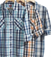 Add a pop of plaid into your wardrobe for a preppy upgrade with this slim-fitting woven shirt from Izod.