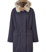 Elevate your cold weather ensembles with this luxe fur-lined parka from Yves Salomon - Hood with fur lining and drawstring, long sleeves, hidden front placket, internal drawstring waist, flap pockets at hips - Style with a mini dress and ribbed tights or skinny jeans and a tartan scarf