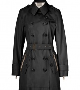With heritage detailing reflecting the original Burberry trench coat, this cotton poplin version from Burberry Brit counts as an iconic, multi-season investment - Classic collar with double belted latch and hook closure, set-in long sleeves with belted zippered cuffs, epaulettes, gun flap, double-breasted button-down front, zippered pockets, belted waist, rain shield - Fitted silhouette - Pair with slim trousers or jeans and a cashmere pullover