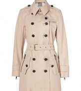With heritage detailing reflecting the original Burberry trench coat, this cotton poplin version from Burberry Brit counts as an iconic, multi-season investment - Classic collar with double belted latch and hook closure, set-in long sleeves with belted zippered cuffs, epaulettes, gun flap, double-breasted button-down front, zippered pockets, belted waist, rain shield - Fitted silhouette - Pair with slim trousers or jeans and a cashmere pullover
