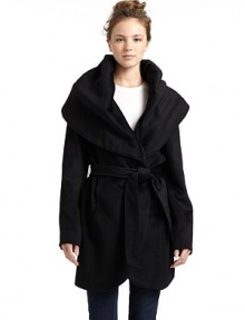 THE LOOKDramatic shawl collarLightly padded shouldersWrap frontRemovable tie-front beltDual front seam pocketsTHE FITAbout 34 from shoulder to hemTHE MATERIALWool/silk/nylonFully linedCARE & ORIGINDry cleanImportedModel shown is 5'10 (177cm) wearing US size Small. THE LOOKDramatic shawl collarLightly padded shouldersWrap frontRemovable tie-front beltDual front seam pocketsTHE FITAbout 34 from shoulder to hemTHE MATERIALWool/silk/nylonFully linedCARE & ORIGINDry cleanImportedModel shown is 5'10 (177cm) wearing US size Small.