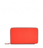 Tote around your travel essentials in style with this colorblocked leather case from Marc by Marc Jacobs - Zip-around closure, front logo, inside zippered pocket, multiple card slots, ID window, pen loop - Perfect for keeping organized on vacation or as a sleek holiday gift