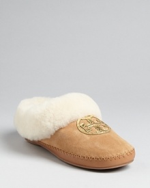 Slip into plush shearling luxury: these Tory Burch scuff slippers have it covered.