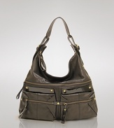 Kooba's slouchy leather hobo is a chic way to take it all with you. With ample pockets and a roomy interior, we love this shoulder bag paired with everything from inky denim to understated day dresses.