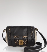 Compact style get a tough-chic with this leather and linen crossbody from Sam Edelman. Sized for both day and night, this two-tone bag will be your new round-the-clock essential.