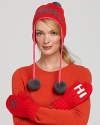 Feel like a princess in this cute knit ski hat with an intarsia crown and pom-pon embellished braid ties.