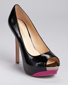 Covetable and color blocked--these glossy platform pumps from Enzo Angiolini showcase the prettiest colors of the season. Covetable and color blocked--these glossy platform pumps from Enzo Angiolini showcase the prettiest colors of the season.