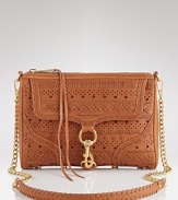 Rebecca Minkoff goes boho-luxe with this woven leather clutch. Textured leather lends a cool vintage vibe, while a convertible silhouette is prime for day-to-night.