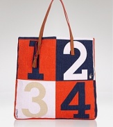 Accessorizing is as easy as 1-2-3 with this top handle tote from Loquita. Whether as a beach bag or city sidekick, it's the perfect choice for the on-the-go girl.