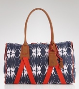 Loquita emboldens the classic canvas duffel, splashing it with an all-over bird print. Whether you're beach bound or have your sights on the city, it's a perfect carryall for the on-the-go girl.