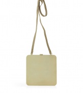 Deceptively simple, this crossbody bag features hidden volume with a streamlined flat front and a pouch-like back - Flat frame with snap closure, pouch detail, long shoulder strap - Pair with an elevated jeans-and-tee ensemble or a casual cocktail look
