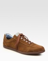 Sporty styling in supple Italian sueded calfskin elevates your casual wardrobe.Padded insoleRubber soleMade in Italy