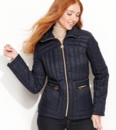 MICHAEL Michael Kors' puffer jacket feels light but features down-blend insulation for major warmth. The matching pack-sack is perfect for an on-the-go lifestyle, while bright metal hardware ups the glam factor!