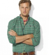 A handsome sport shirt is rendered in woven cotton with a preppy plaid pattern and relaxed fit for classic style.