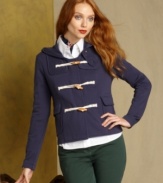 Set your sights on Tommy Hilfiger's cropped, knit hoodie. Decked out in nautical-inspired details like toggle-front and button-tab closures, it adds a classic touch any ensemble.