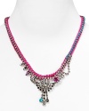 A bold take on this season's homespun trend, this woven fluoro necklace from Juicy Couture hints at your bright side.