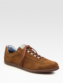 Sporty styling in supple Italian sueded calfskin elevates your casual wardrobe.Padded insoleRubber soleMade in Italy Sporty styling in supple Italian sueded calfskin elevates your casual wardrobe.Padded insoleRubber soleMade in Italy
