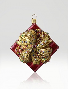 The Heritage of Jay Strongwater began as the bejeweled frame with beautiful stone settings and scrolls, becoming the source of inspiration for this season's new glass ornament collection. This ornament is mouth blown and decorated in Poland with a wonderful team of old world craftsmen. Detailed with crystals, hand applied jewel tone colors and scrolls as if it were a fine piece of jewelry. GlassCrystalMouth blownHand-painted and hand-set4H X 3.5W X 2DImported The Heritage of Jay Strongwater began as the bejeweled frame with beautiful stone settings and scrolls, becoming the source of inspiration for this season's new glass ornament collection. This ornament is mouth blown and decorated in Poland with a wonderful team of old world craftsmen. Detailed with crystals, hand applied jewel tone colors and scrolls as if it were a fine piece of jewelry. GlassCrystalMouth blownHand-painted and hand-set4H X 3.5W X 2DImported