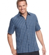 Don't box yourself in. Step out in an eye-catching pattern with this checkered shirt from via Europa.