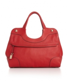 Burnt edges highlight the curvy lines of this chic shopper crafted in classically elegant pebbled leather by Furla. Burnt edges highlight the curvy lines of this chic shopper crafted in classically elegant pebbled leather by Furla.