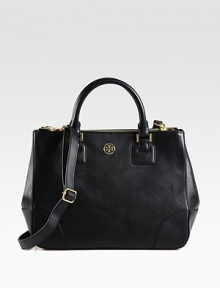 Vibrant saffiano leather in a convertible double zip-top carryall.Double top handles, 5 dropAdjustable removable shoulder strap, 21-23½ dropTop snap closureProtective metal feetTwo top zip compartmentsOne inside zip pocketTwo inside open pocketsFully lined13¾W X 10½H X 3½DImported Vibrant saffiano leather in a convertible double zip-top carryall.Double top handles, 5 dropAdjustable removable shoulder strap, 21-23½ dropTop snap closureProtective metal feetTwo top zip compartmentsOne inside zip pocketTwo inside open pocketsFully lined13¾W X 10½H X 3½DImported