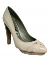 DKNY's career-chic Nora platform pumps feature a twist detail on the toe and a stacked platform and heel.