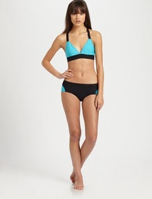 An intriguing take on a classic swim design with a rocker-chic mesh waistband and on-trend colorblocking.Stretch comfortMesh waistbandFully lined80% polyamide/20% elastaneHand washMade in USA of Italian fabric Please note: Bikini top sold separately. An intriguing take on a classic swim design with a rocker-chic mesh waistband and on-trend colorblocking.Stretch comfortMesh waistbandFully lined80% polyamide/20% elastaneHand washMade in USA of Italian fabric Please note: Bikini top sold separately.