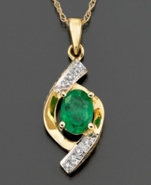 Get swept away with this swirling and sparkling pendant. Round-cut diamond accents encircle enticing oval-cut emerald (5/8 ct. t.w.) set in 14k gold. Approximate length: 18 inches. Approximate drop: 1 inch. Get swept away with this swirling and sparkling pendant. Round-cut diamond accents encircle enticing oval-cut emerald (5/8 ct. t.w.) set in 14k gold. Approximate length: 18 inches. Approximate drop: 1 inch.
