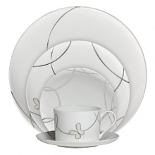 Designed with a modern bride in mind, the Lismore Butterfly dinnerware collection features a contemporary coupe shape accented with a soft iridescent lavender butterfly motif. Designed with a modern bride in mind, the Lismore Butterfly dinnerware collection features a contemporary coupe shape accented with a soft iridescent lavender butterfly motif.