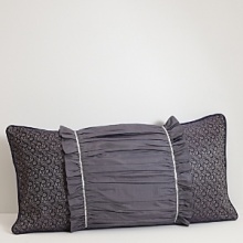 Highlighted by a ruffled center, this jacquard printed pillow complements the Waterford Dylan collection. Highlighted by a ruffled center, this jacquard printed pillow complements the Waterford Dylan collection.