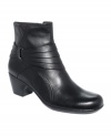 Clarks' Ingalls Pecos booties are sleek and comfortable with faux wrapped detail around the ankle and a squared off toe.
