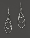 Overlapping ovals of bamboo-shaped sterling silver gently swing and dangle.