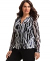 Alfani's presents a versatile addition to your day-to-play wardrobe with this long sleeve plus size top, featuring a vivid print-- dress it up with trousers or down with denim. (Clearance)