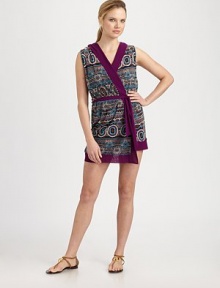 A gorgeous tribal print decorates this wraparound design with a convenient hood.Attached hoodSelf-tie beltSolid trimPolyamideDry cleanMade in Italy A gorgeous tribal print decorates this wraparound design with a convenient hood.Attached hoodSelf-tie beltSolid trimPolyamideDry cleanMade in Italy