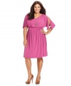 Delight from desk to dinner with Spense's flutter sleeve plus size dress, enhanced by a flattering A-line silhouette.