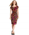 A bold print enlivens this dress from NY Collection while the seamed and gathered waist ensures a beautiful fit.