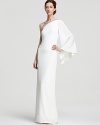 At once minimalist and dramatic, this Nicole Miller gown boasts a single kimono sleeve for a striking statement.