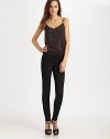 Feather sequins populate this gorgeous blouson cami.Spaghetti strapsV necklineElastic waistAbout 22 from shoulder to hemViscoseDry cleanImported