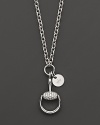 Glittering diamonds stud this 18K white gold horsebit pendant.