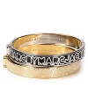 Fun logo lettering adorns this modern, skinny bangle from MARC BY MARC JACOBS.