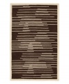 Light and dark tones of brown and beige collide to produce this dynamic piece, designed by Surya's world-renowned artisans. Transforming any decor from static to stirring, the Studio Rowe area rug uses hand-tufted New Zealand wool to create an ultra-soft surface that lasts in the most high-traffic environments.